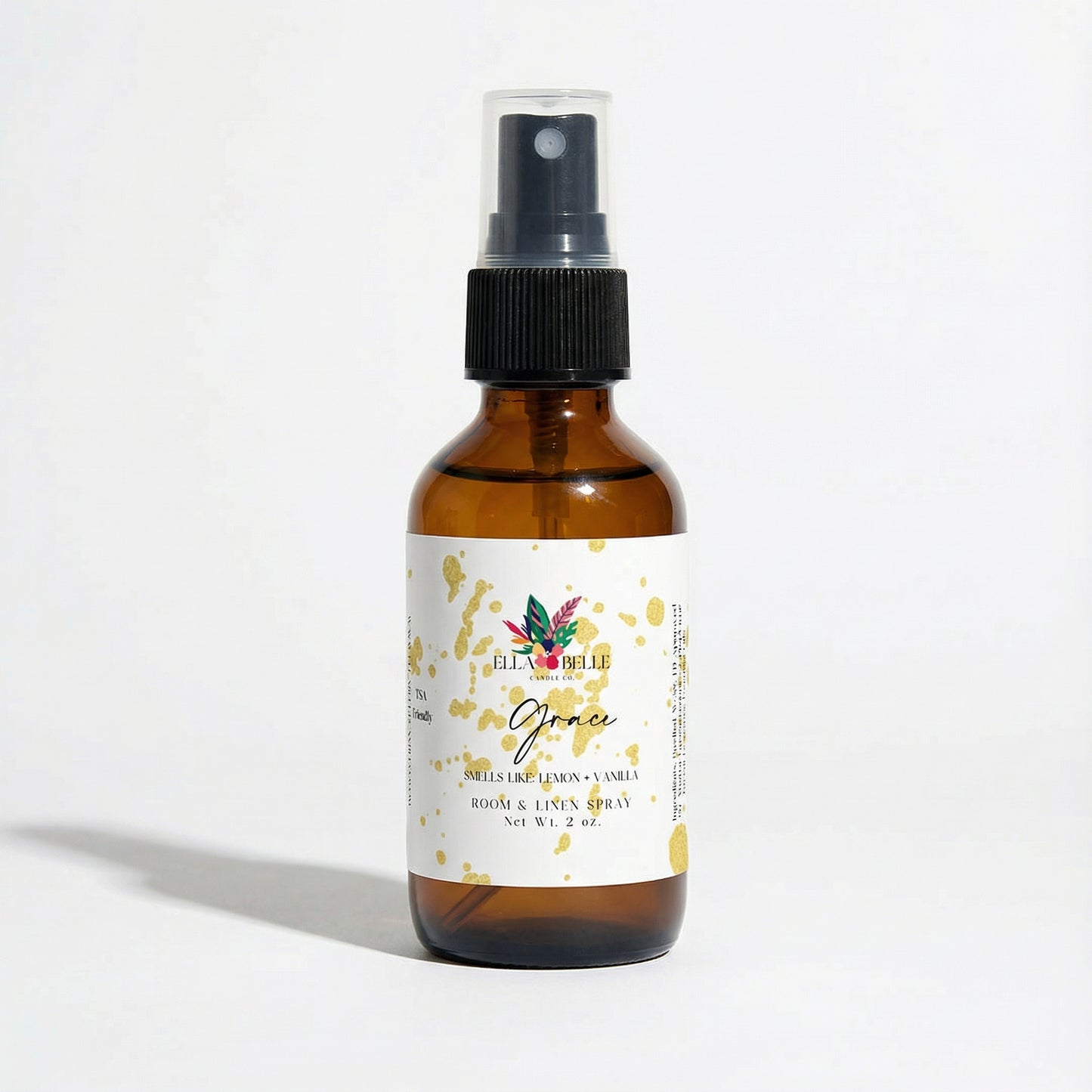 Brown spray bottle with a label on a white background
