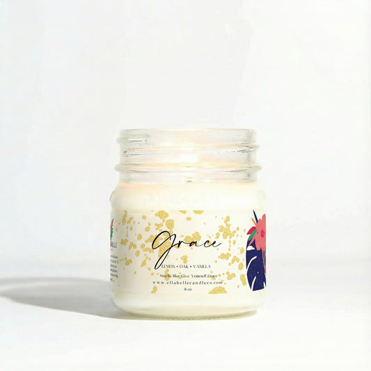 Candle jar with a decorative label on a clear background

