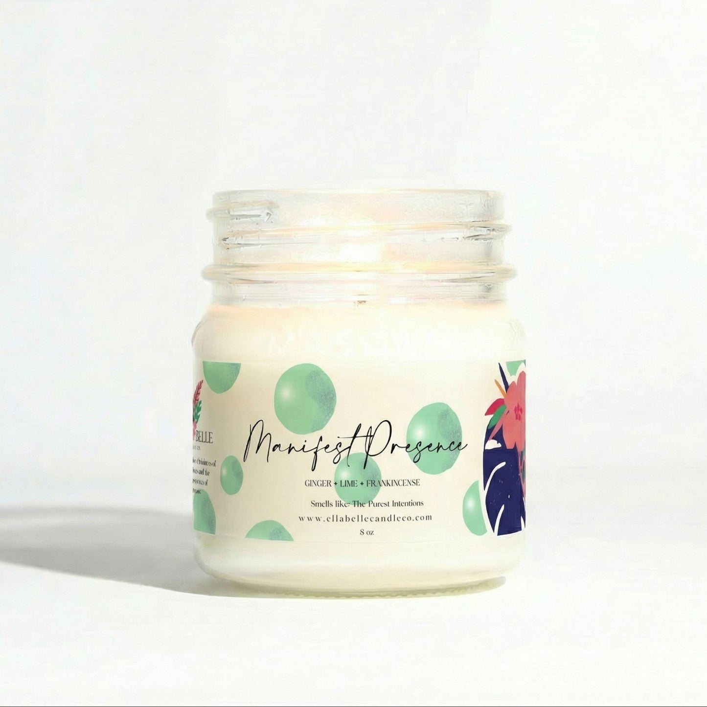 Candle jar with a colorful label on a white background