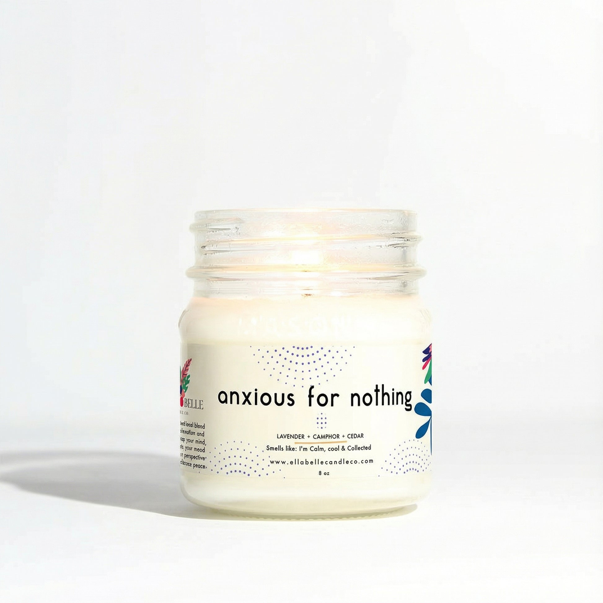 Candle jar labeled 'anxious for nothing' on a clear background
