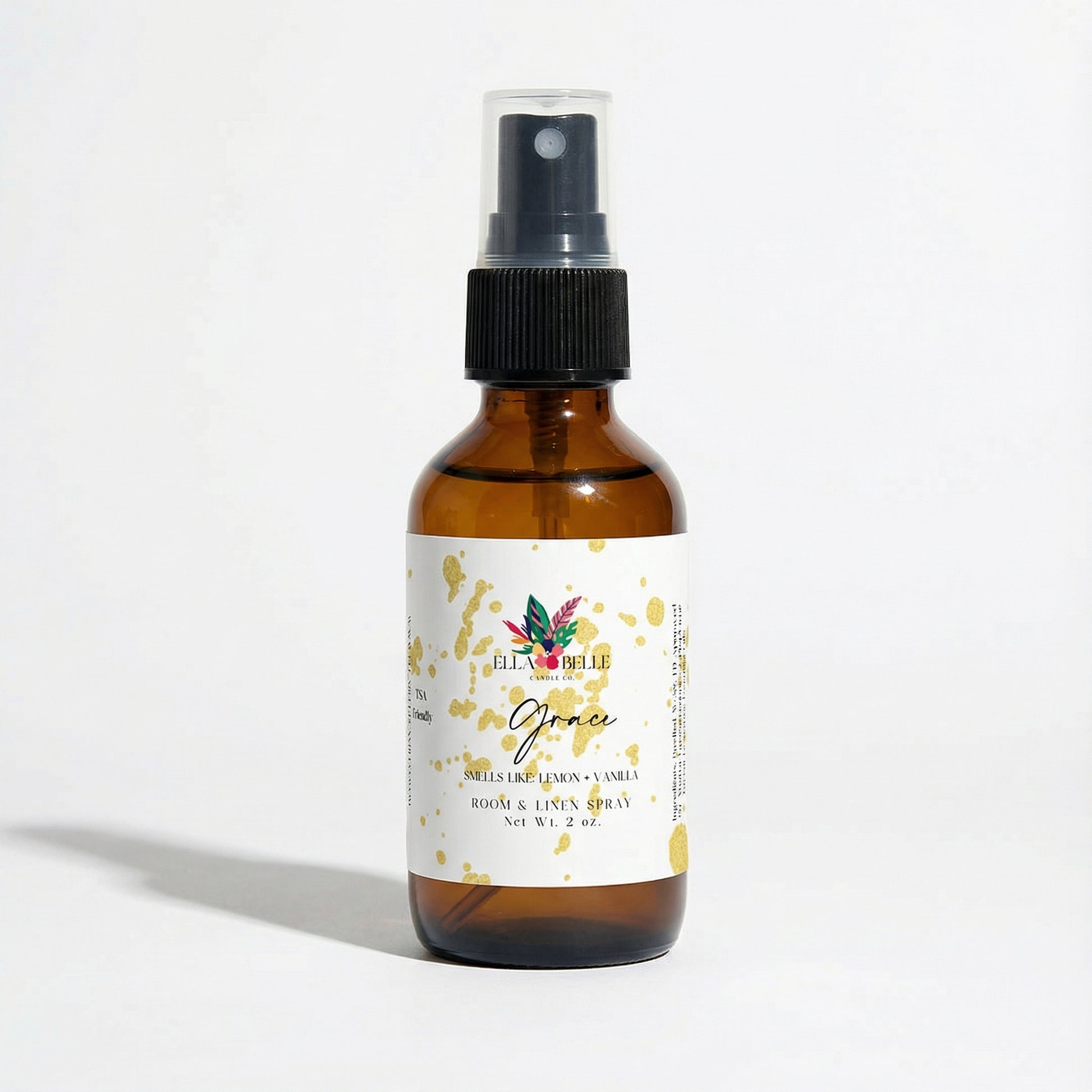 Brown spray bottle with a label on a white background